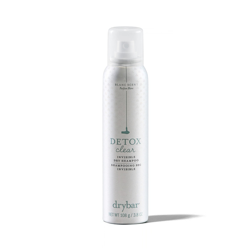 Drybar Detox Clear Invisible Dry Shampoo aerosol can on a light gray background.